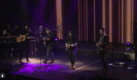 Justus Morales performing with band